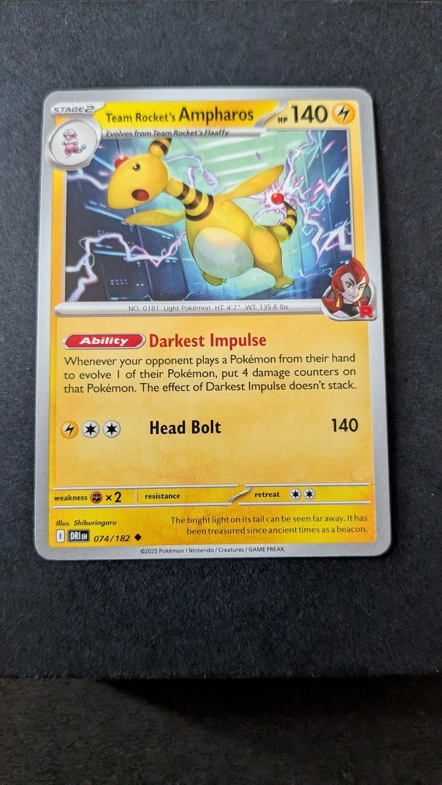View 2 of Team Rocket's Ampharos 074/182 Uncommon Destined Rivals Pokemon Near Mint